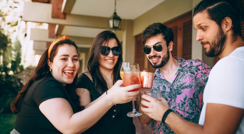 friends enjoying cocktails together