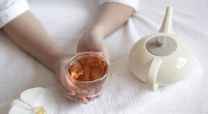 Someone enjoying a warm cup of tea